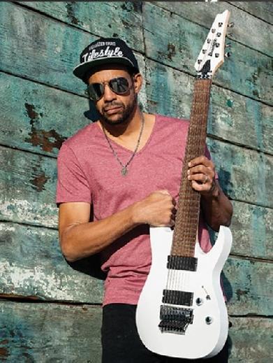 Tony MacAlpine and band perform 